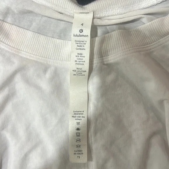 This is a white, size 4, Lululemon drawstring tank top! No stains! Smoke free 🏠 - Picture 2 of 4
